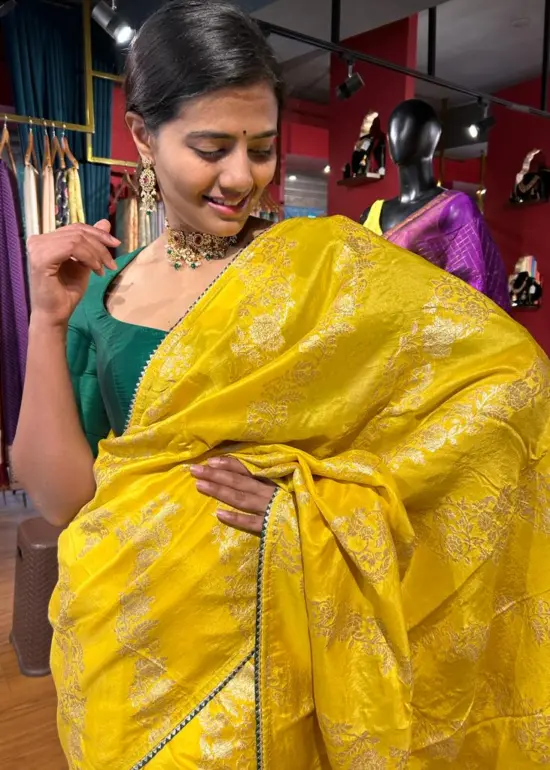 Yellow Banarasi Silk Saree highlighted with Leheriya Weaves