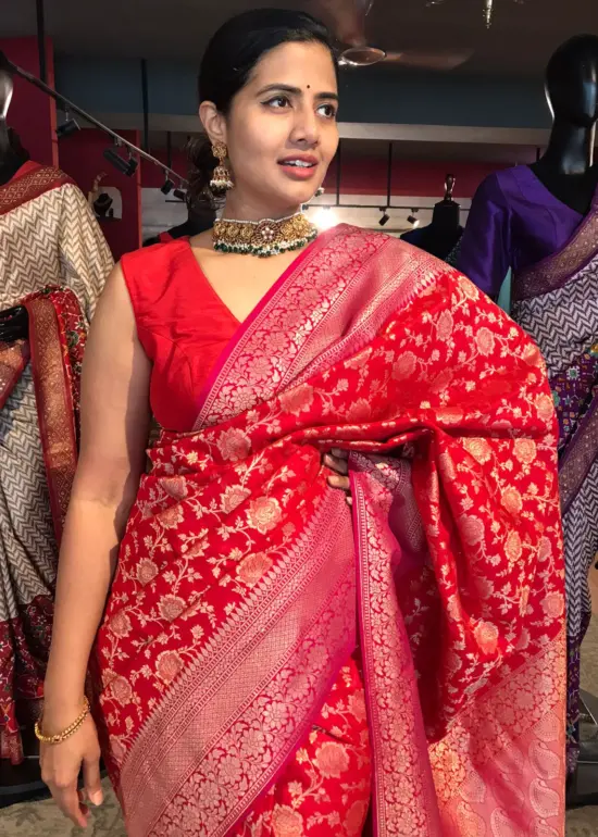 Red Banarasi Silk Saree highlighted with Floral weaves and Contrast Woven Border