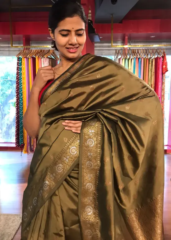 Beige Taupe Banarasi Silk Saree highlighted with Gold Zari Buttas