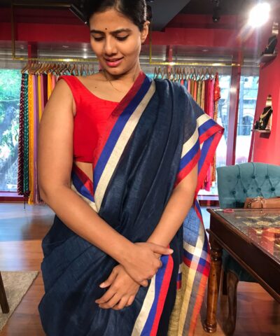 Navyblue Pure Linen Saree highlighted with Multicolored Border