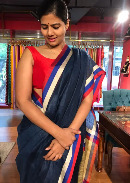 Navyblue Pure Linen Saree highlighted with Multicolored Border