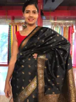 Black Banarasi Silk Saree highlighted with Gold Zari Buttas