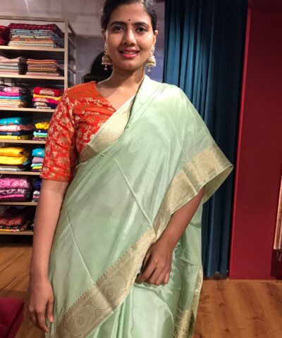Mint Dola Silk Saree highlighted with Gold Zari Border