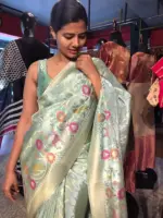 Sea Green Tissue Silk Saree woven with Beautiful Shikargarh Motifs