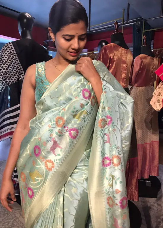 Sea Green Tissue Silk Saree woven with Beautiful Shikargarh Motifs