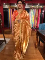 Orange Tissue Silk Saree woven with Beautiful Gold Zari Buttis - Image 7