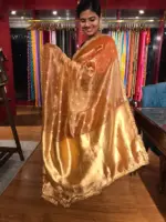 Orange Tissue Silk Saree woven with Beautiful Gold Zari Buttis - Image 2