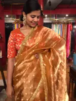 Orange Tissue Silk Saree woven with Beautiful Gold Zari Buttis - Image 5