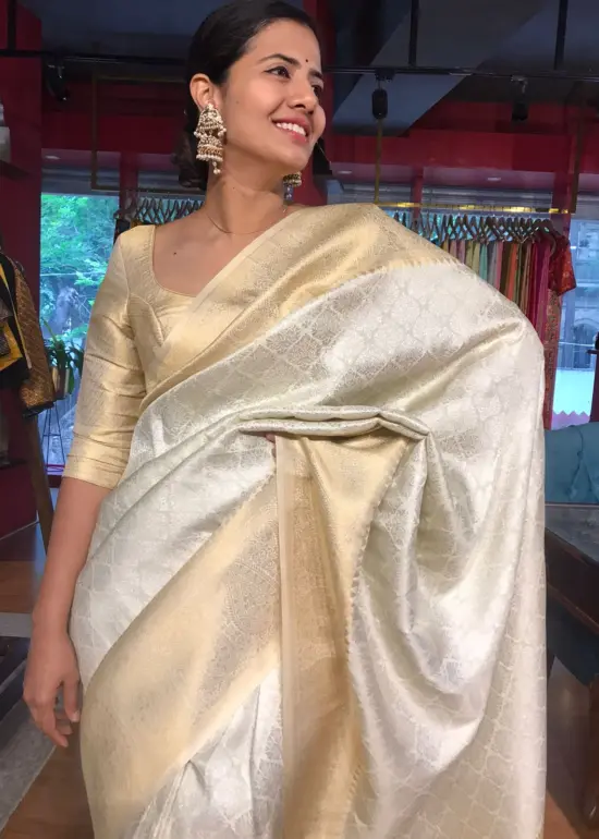 Offwhite Banarasi Silk Saree with Gold and Silver Zari Weaves
