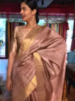 Dusty Rose Pure Tussar Silk Saree highlighted with Gold Zari Border