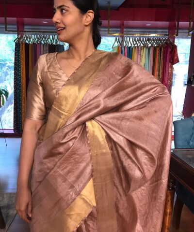 Dusty Rose Pure Tussar Silk Saree highlighted with Gold Zari Border