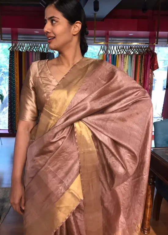 Dusty Rose Pure Tussar Silk Saree highlighted with Gold Zari Border