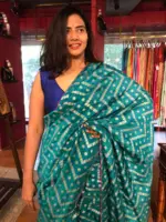Blue Banarasi Silk Saree highlighted with Leheriya Weaves