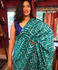 Blue Banarasi Silk Saree highlighted with Leheriya Weaves