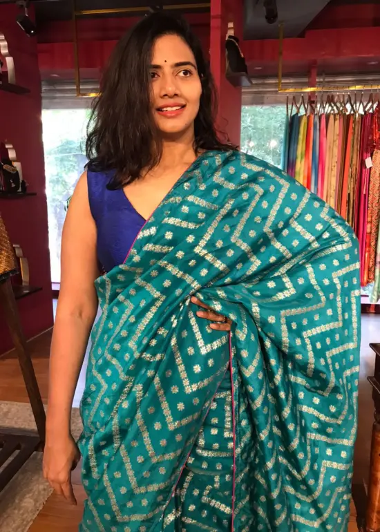 Blue Banarasi Silk Saree highlighted with Leheriya Weaves