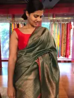Bottle Green Banarasi Silk Saree highlighted with Antique Gold Zari  Weaves