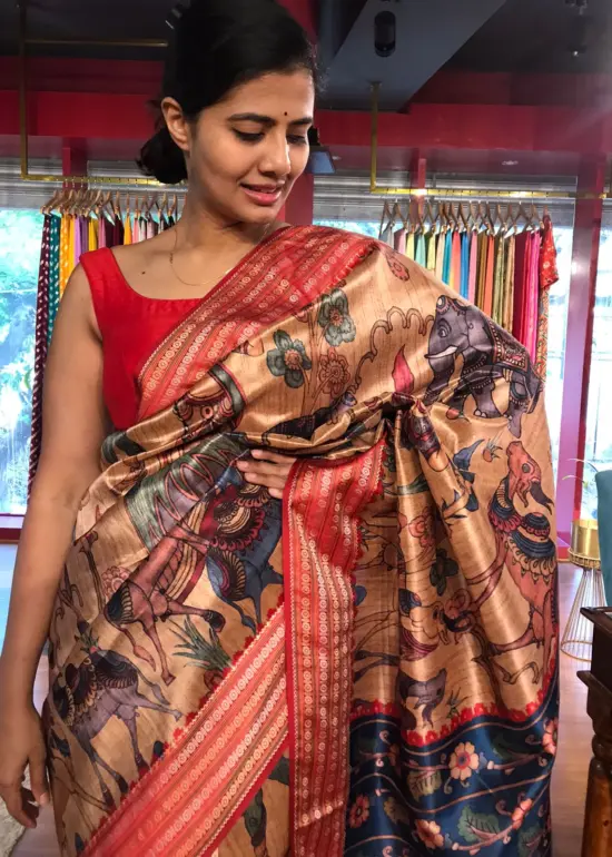Beige Banarasi Silk Saree highlighted with Kalamkari Prints