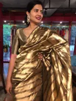 Molten Gold Tissue Silk Saree woven in Leheriya Pattern