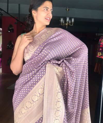 Lilac Banarasi Georgette Silk Saree highlighted with Zari Buttas