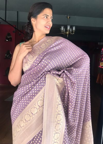 Lilac Banarasi Georgette Silk Saree highlighted with Zari Buttas