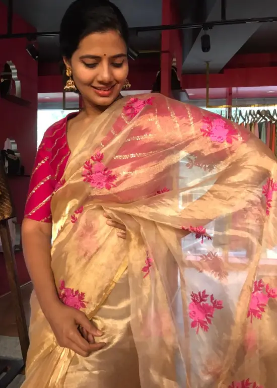 Gold Tissue Silk Saree highlighted with cross stitch embroidery