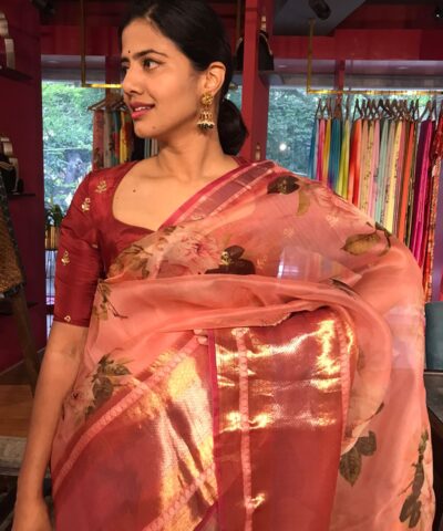 Peach Printed Organza Silk Saree highlighted with Kanchi Zari Border