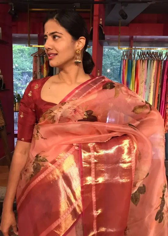 Peach Printed Organza Silk Saree highlighted with Kanchi Zari Border