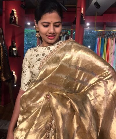 Ivory Gold Tissue Silk Saree woven in Leheriya Pattern