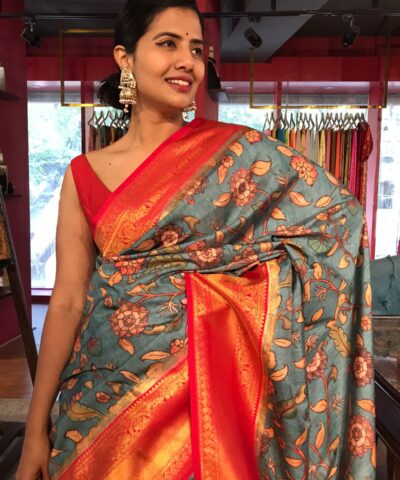 Blue Banarasi Silk Saree highlighted with Kalamkari Prints and Silk Border