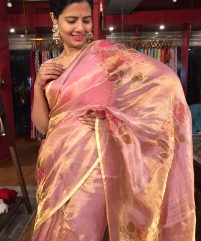 Nude Pink Tissue Silk Saree highlighted with Hand painted Florals and hand embroidery