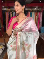 Baby Blue Tissue Silk Saree highlighted with Hand painted Florals and hand embroidery