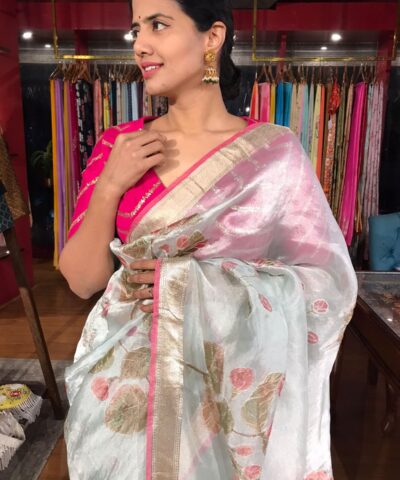 Baby Blue Tissue Silk Saree highlighted with Hand painted Florals and hand embroidery
