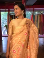 Peach Tissue Silk Saree with woven Shikargarh Motifs