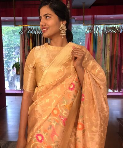 Peach Tissue Silk Saree with woven Shikargarh Motifs