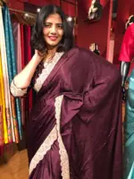 Burgundy Crepe Silk Saree highlighted with Hand Embroidery and Badla Work