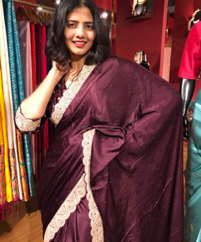 Burgundy Crepe Silk Saree highlighted with Hand Embroidery and Badla Work