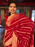 Red Banarasi Silk Saree in Georgette highlighted with Pichwai Weaves
