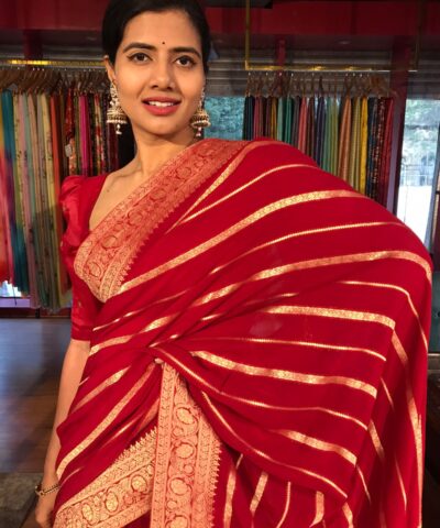 Red Banarasi Silk Saree in Georgette highlighted with Pichwai Weaves