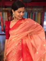 Peach Organza Saree with Contrast Zari Border and Gold Zari Buttis