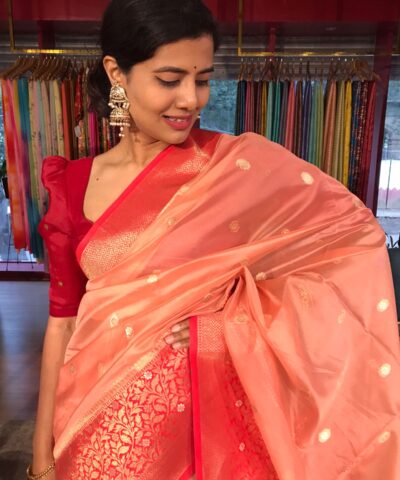 Peach Organza Saree with Contrast Zari Border and Gold Zari Buttis