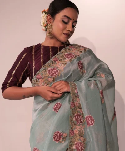 Blue Tissue Silk Saree highlighted with Cutwork Embroidery