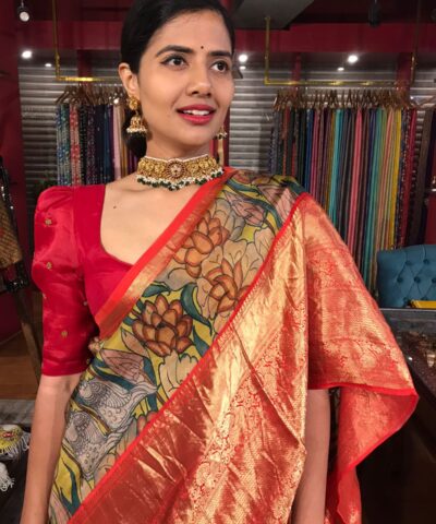 Yellow Kanchivaram Silk Saree with Beautiful Kalamkari Prints