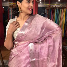 Lavender Pink Tissue Silk Saree highlighted with Woven Silver Zari Border