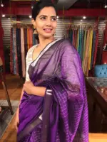 Front view of a model showcasing a Purple Mangalagiri Silk Saree Handwoven in Chequered Pattern, Suitable for Festivals (Diwali, Pongal, Navratri) By Mirra Clothing