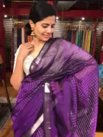 Close up view of a model showcasing Purple Mangalagiri Silk Saree Handwoven in Chequered Pattern, Suitable for Weddings By Mirra Clothing