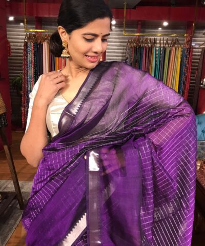 Close up view of a model showcasing Purple Mangalagiri Silk Saree Handwoven in Chequered Pattern, Suitable for Weddings By Mirra Clothing