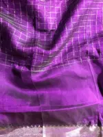 Close up view of a model showcasing Purple Mangalagiri Silk Saree Handwoven in Chequered Pattern, Suitable for Cultural Functions By Mirra Clothing