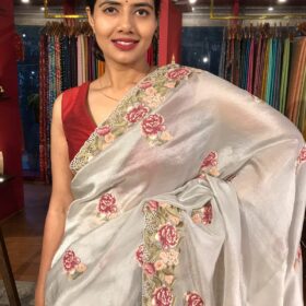Silver Grey Tissue Silk Saree adorned with Cutwork Embroidery
