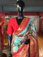 Teal Banarasi Dupion Silk Saree highlighted with Kalamkari Prints and Silk Border