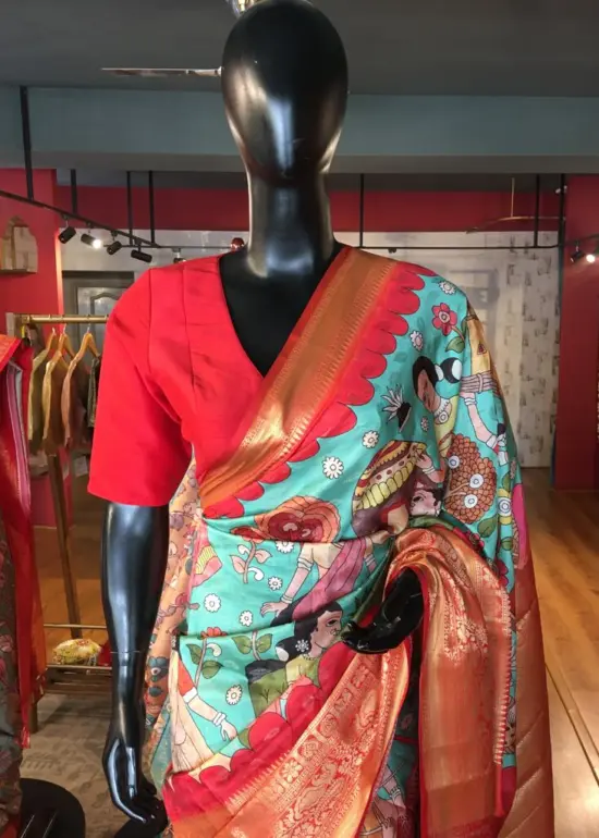 Teal Banarasi Dupion Silk Saree highlighted with Kalamkari Prints and Silk Border